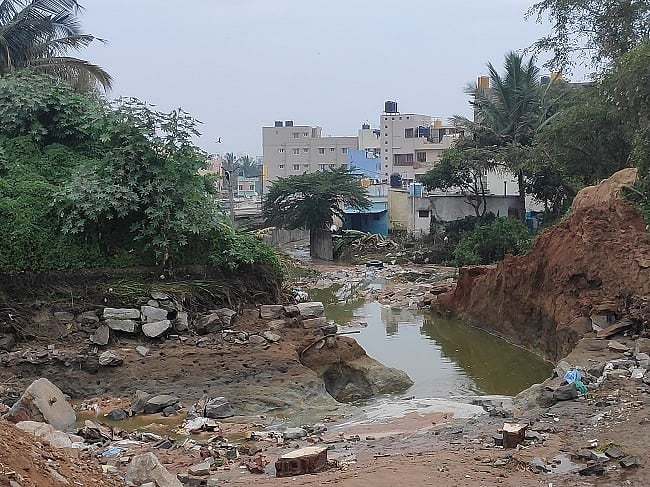 Hulimavu lake breach: Residents left to clean up as civic body indulges ...