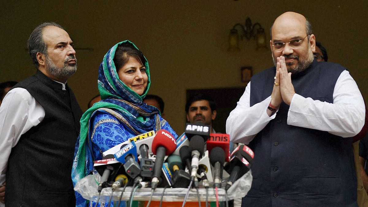 PDP President Mehbooba Mufti with BJP President Amit Shah (Photo: PTI)