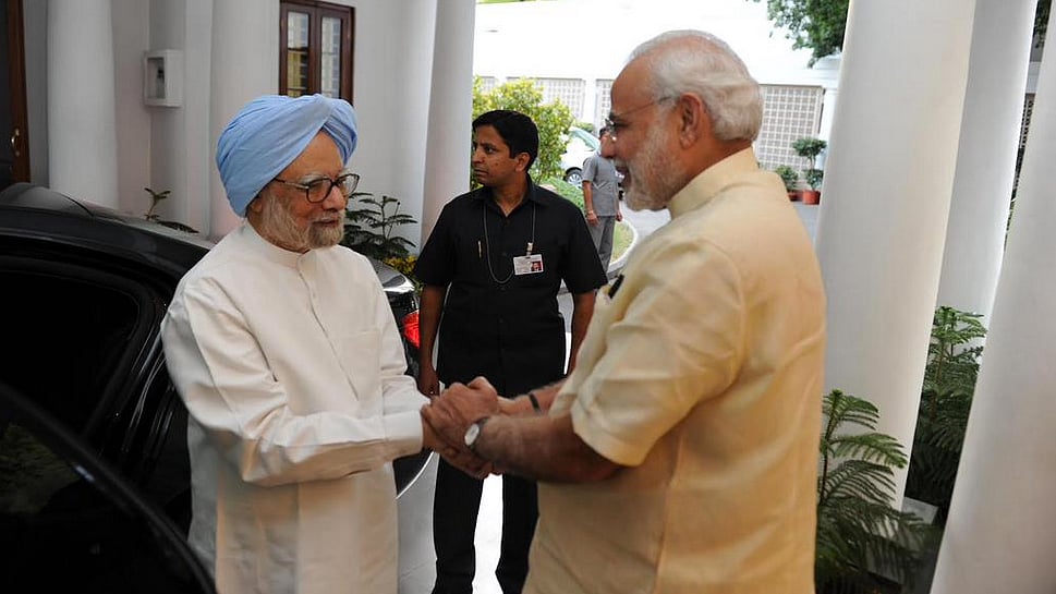 The PM greets his predecessor at his residence, 7 Race Course Road.