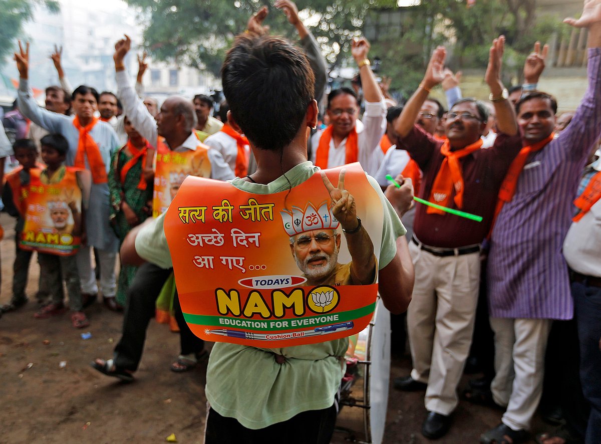 Supporters celebrate BJP’s resounding victory in general elections in 2014. (File Photo: Reuters)