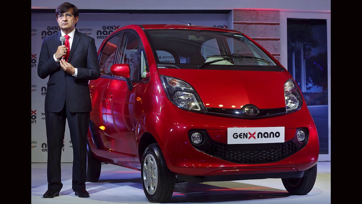 <!--StartFragment-->Mayank Pareek, President of Tata Motors, listens to a question as he stands next to the company’s new GenX Nano car during its launch in Mumbai. (Photo: Reuters) <!--EndFragment-->