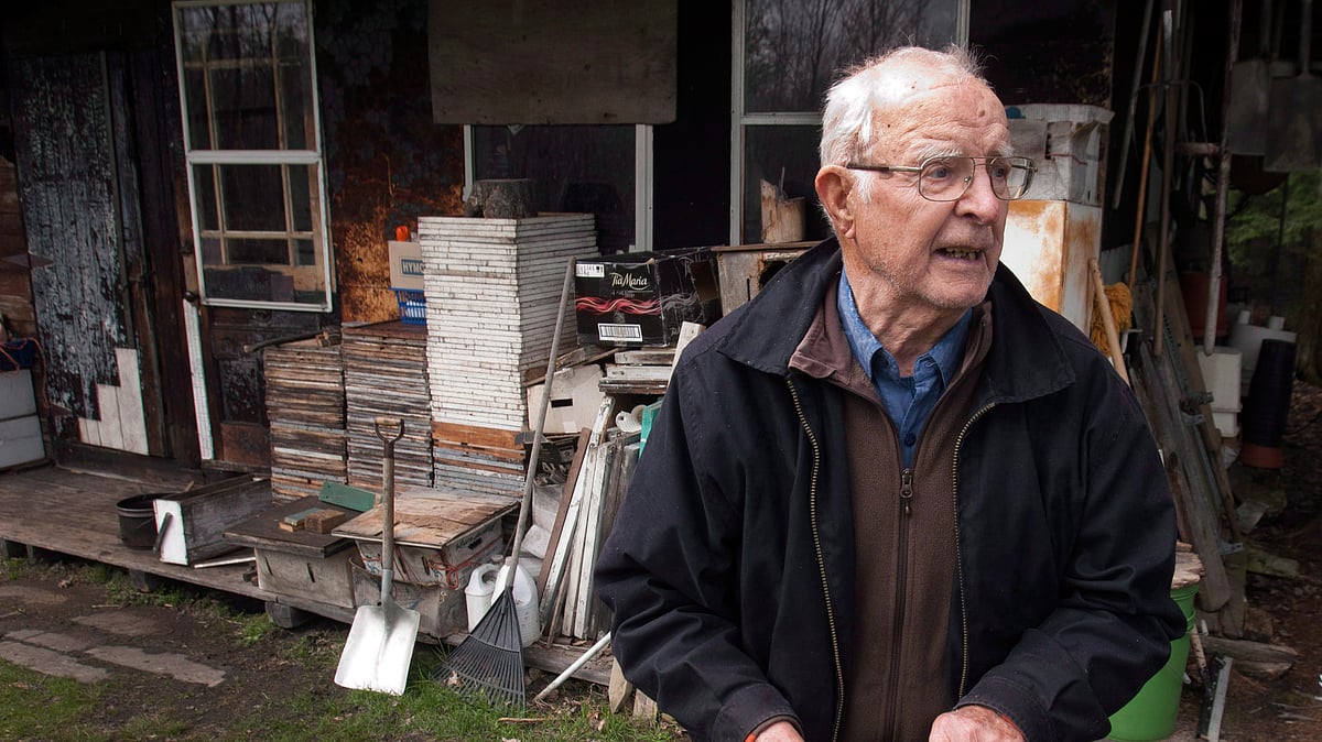 In this April 25, 2012, Vladimir Katriuk stands at his honeybee farm in Ormstown, Quebec. (Photo: AP)