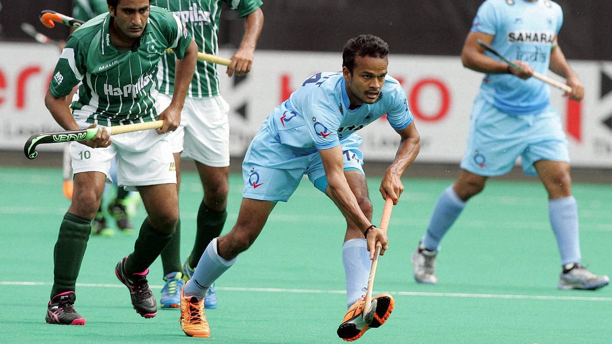 India’s Upadhyay Lalit vies for the ball during the mens Hockey World League semi-finals against Pakistan. (Photo: PTI)