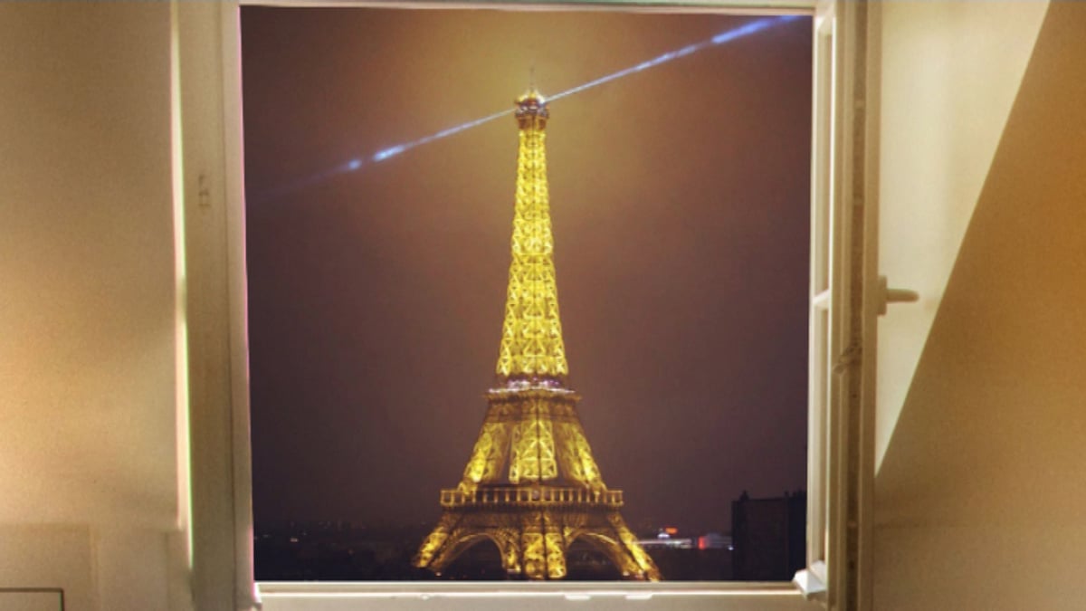 Eiffel Tower through a living room window. (AP video grab)
