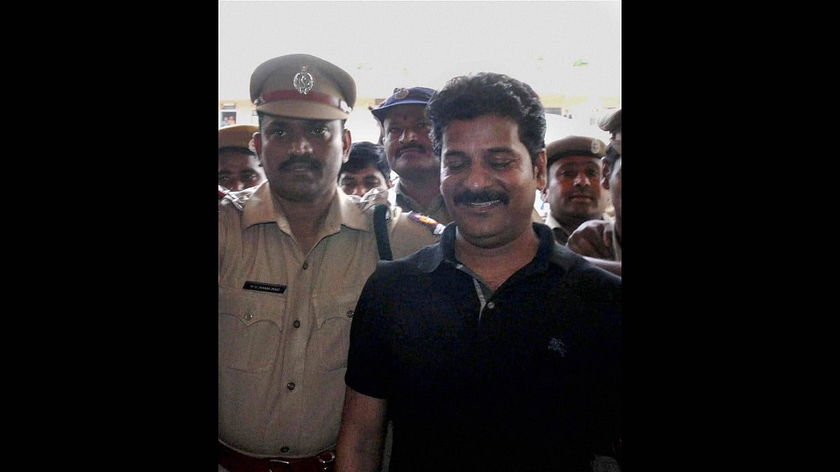 TDP MLA Revanth Reddy being escorted by AP police. (Photo: PTI)