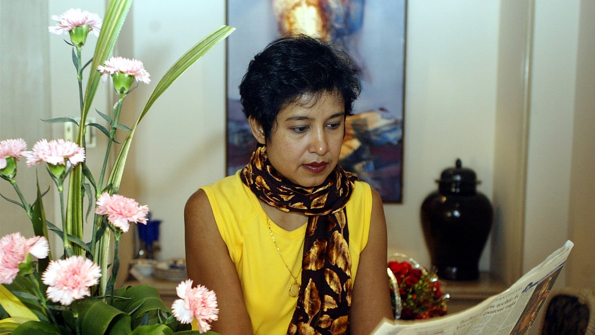 Exiled Bangladeshi author Taslima Nasreen reads a newspaper in a hotel in the eastern Indian city of Kolkata. (Photo: Reuters)