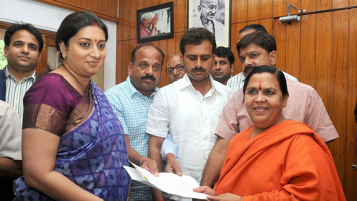  Smriti Irani meets Union Minister for Water Resources, River Development and Ganga Rejuvenation, Uma Bharti. (Photo: PTI)
