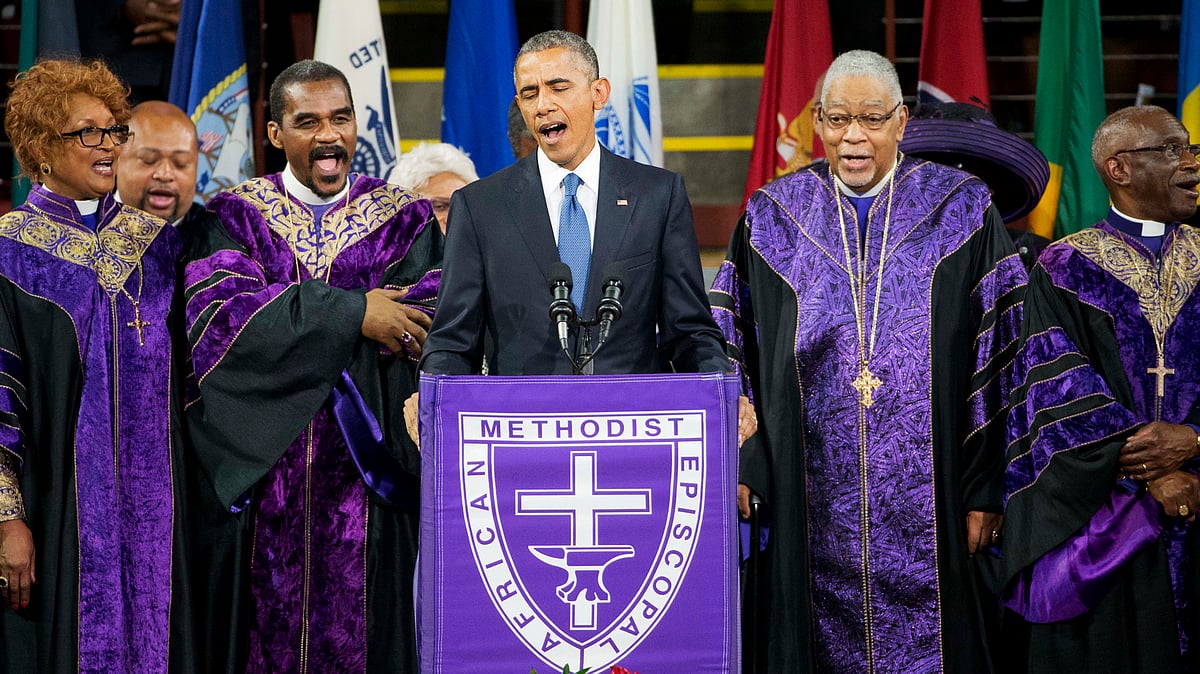 President Barack Obama sings “Amazing Grace” during services honoring the life of Rev. Clementa Pinckney, Friday, June 26, 2015, at the College of Charleston TD Arena in Charleston, S.C.. Pinckney was one of the nine people killed in the shooting at Emanuel AME Church last week in Charleston. ( Photo: AP)