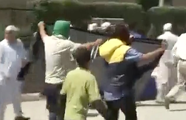 Hurriyat supporters wave ISIS flag in Srinagar. (Photo: ANI screengrab)