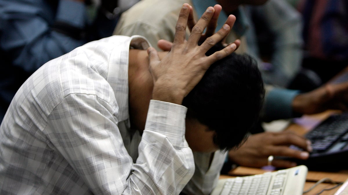 A stock broker reacts at a brokerage firm. (Photo: Reuters)&nbsp;