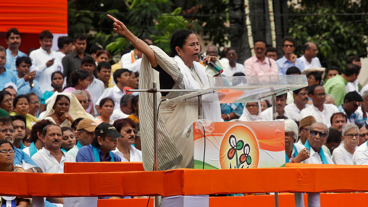 West Bengal Chief Minister Mamata Banerjee addresses supporters during a rally in Kolkata. (Photo: Reuters)<!--EndFragment-->