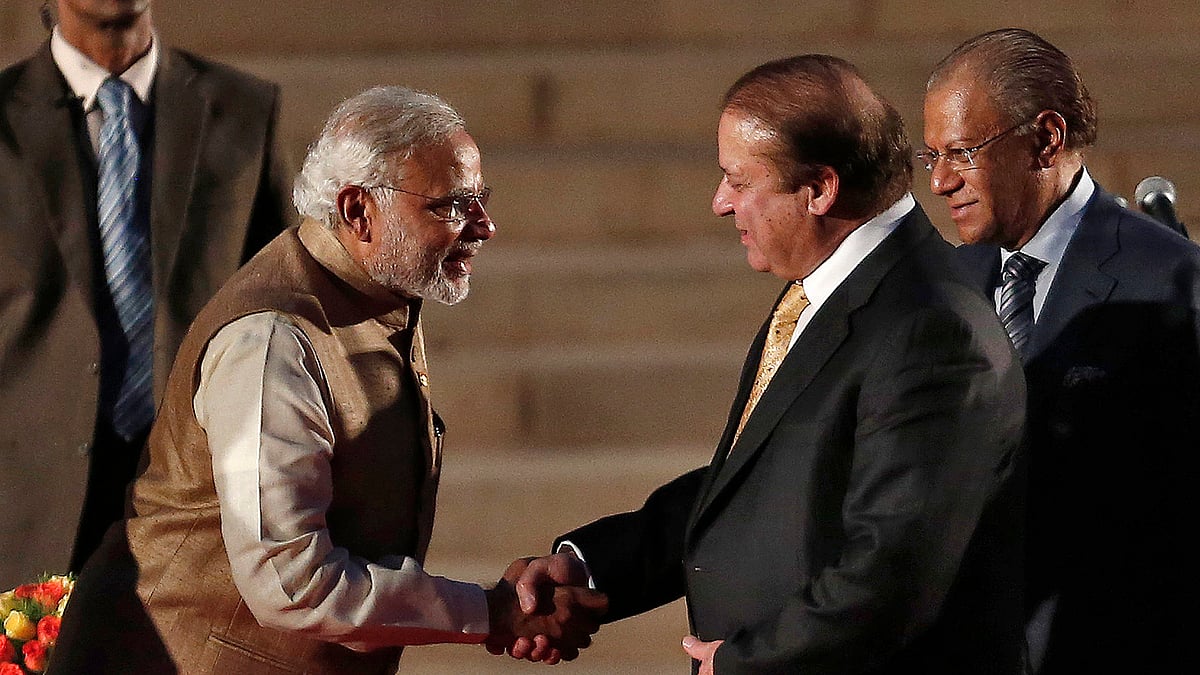 India’s Prime Minister Narendra Modi (L) is greeted by his Pakistani counterpart Nawaz Sharif after Modi took the oath of office at the presidential palace in New Delhi May 26, 2014. (Photo: Reuters)