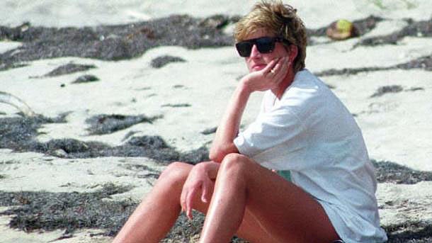Princess Diana relaxes on the beach on a trip to the Caribbean Island of Nevis, 4 January 1993.