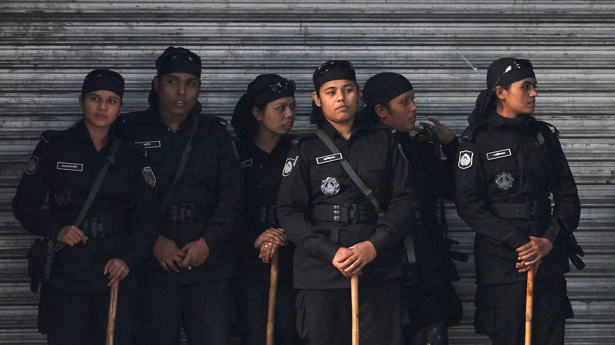 Women members of Bangladesh’s&nbsp;Rapid Action Battalion (RAB) stand guard during a rally  in Dhaka. (Photo: Reuters)