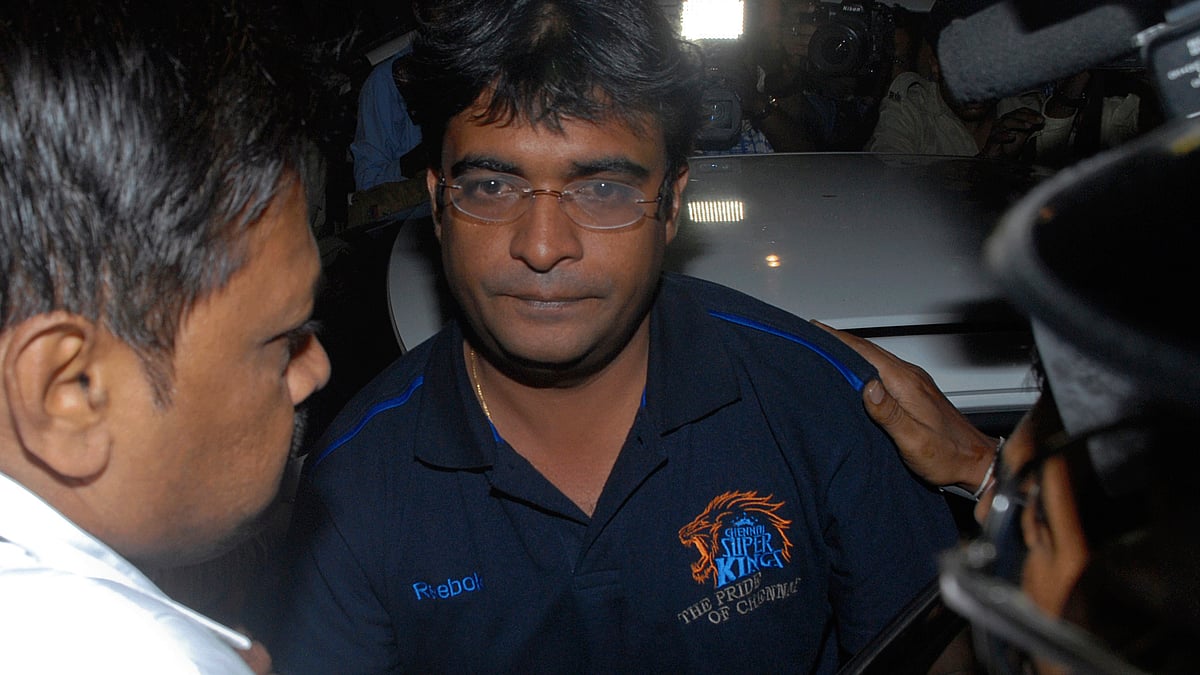 Gurunath Meiyappan, Team Principle, Chennai Super Kings being escorted out of a vehicle by police officers after his arrest. (Photo: Reuters)