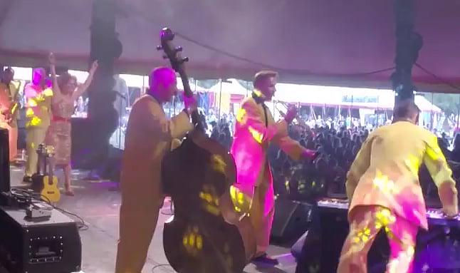Swing band ‘The Jive Aces’ performs at Glastonbury festival in the UK. (Photo: AP screengrab)