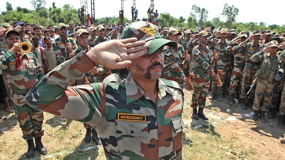 Indian army soldiers pay tribute to their colleague Randeep Singh who was killed in rebel attack in Manipur. (Photo: AP)