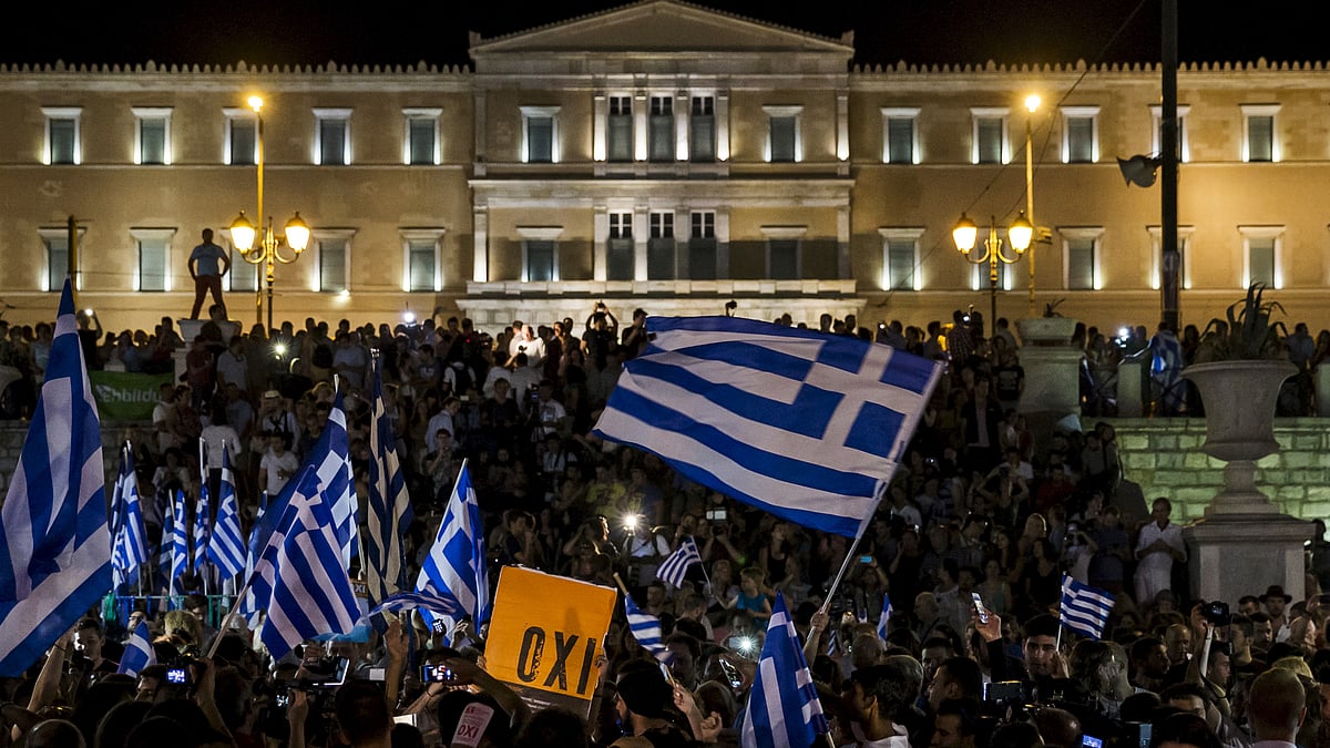 “No” supporters celebrate referendum results on a street in central in Athens, Greece. (Photo: Reuters)