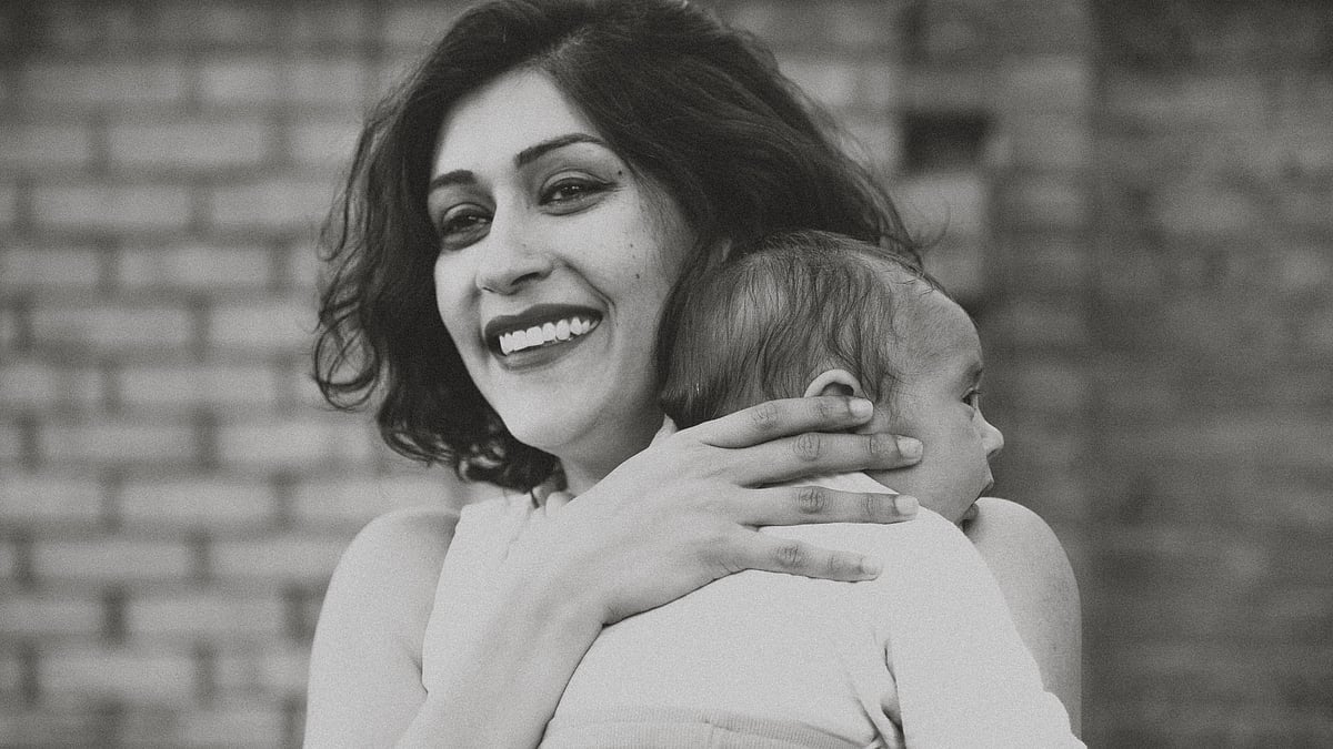 Glowing mother Simrat Ghuman with her little one. 