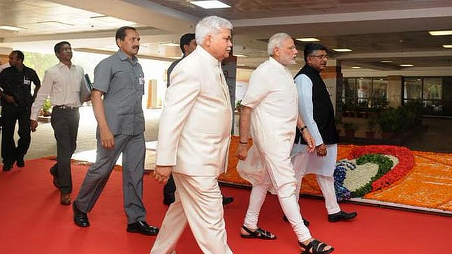 PM Narendra Modi arrives at the Indira Gandhi indoor stadium to launch the ‘Digital India’ initiative. (Photo Courtesy: Twitter/<a href="https://twitter.com/PIB_India">@<b>PIB_India</b></a>)