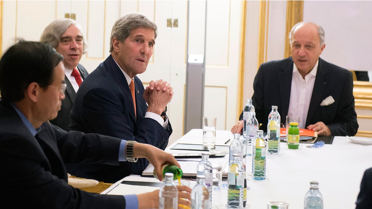 US Secretary of State John Kerry, second right, US Secretary of Energy Ernest Moniz, second left, and French Foreign Minister Laurent Fabius, right, meet for the Iran nuclear talks in Vienna, Austria. (Photo: AP)
