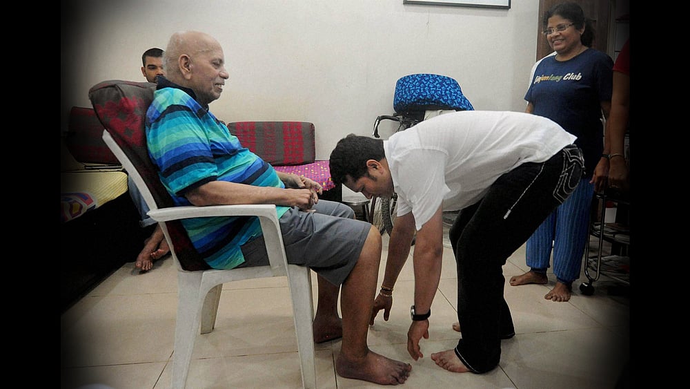 File photo of Sachin Tendulkar seeking blessings from Ramakant Achrekar on Guru Purnima.