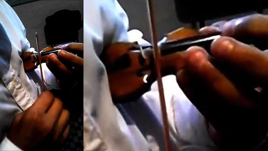 The world’s smallest violin made by a Venezuelan man (Photo: AP screengrab)