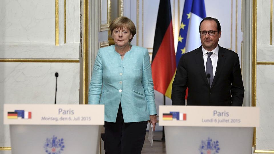 French President Francois Hollande and German Chancellor Angela Merkel in Paris. (Photo: Reuters)