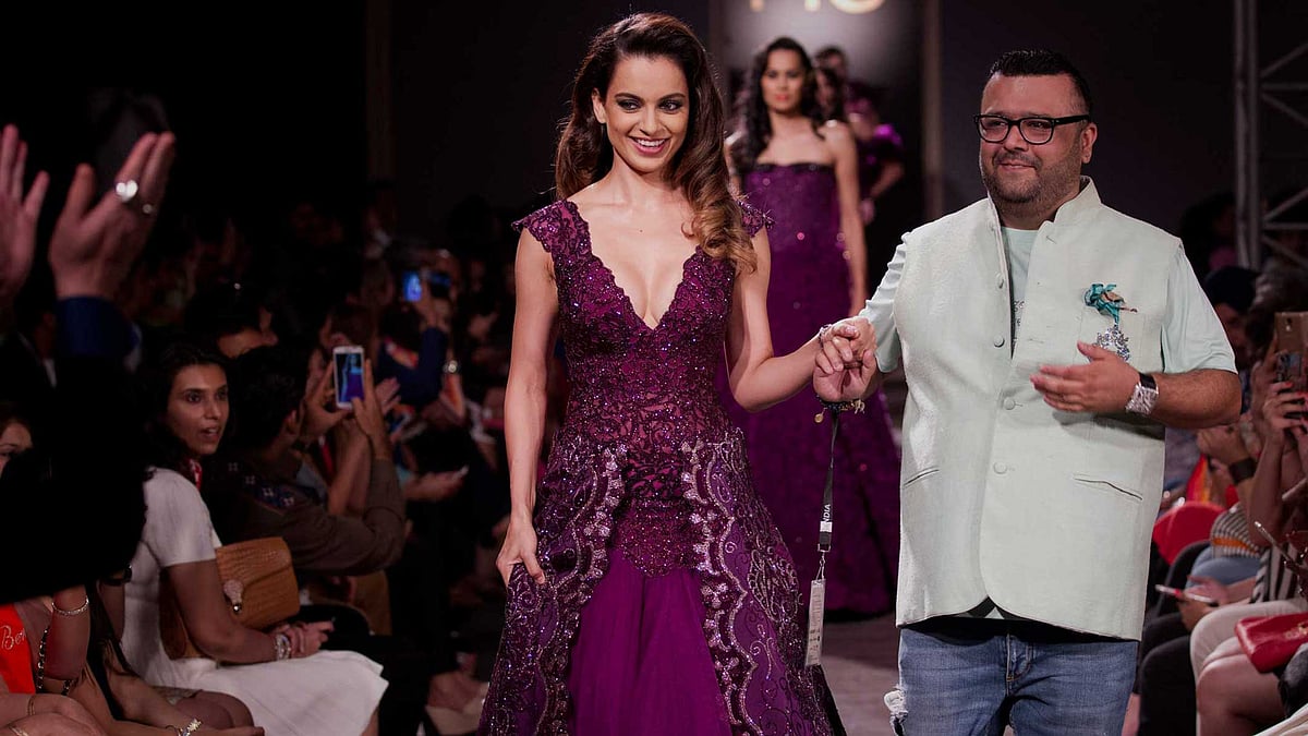 Actress Kangana Ranaut (L) with Manav Gangwani (R). (Photo: AP)