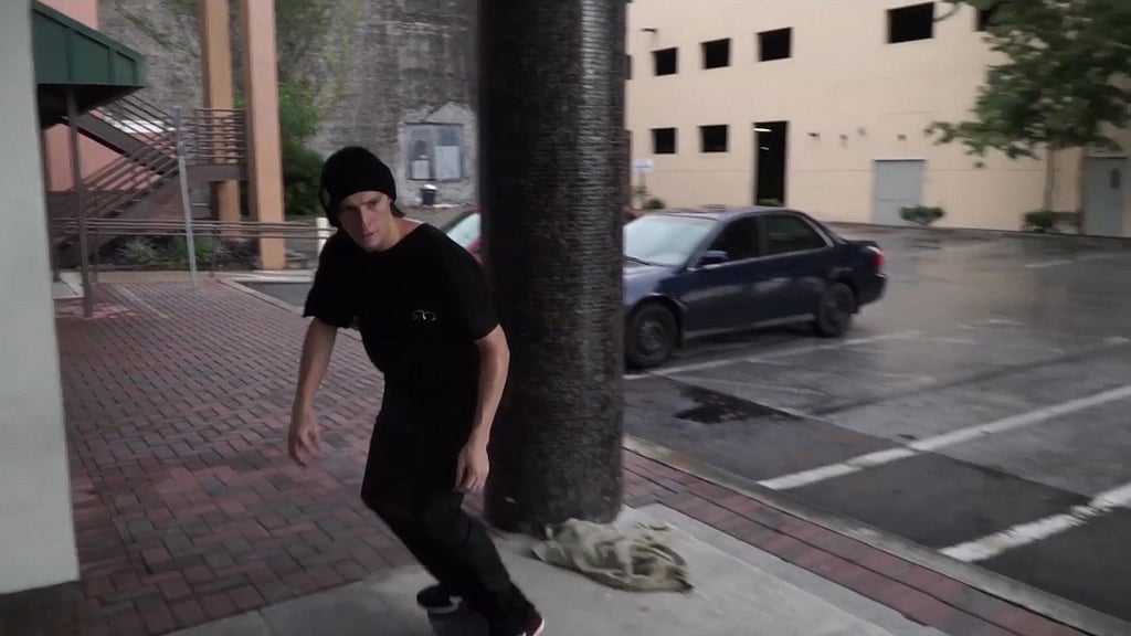 Skater Billy lands a perfect flip on a rainy road but then gets&nbsp;hit at speed by a car. (Photo: AP screengrab)