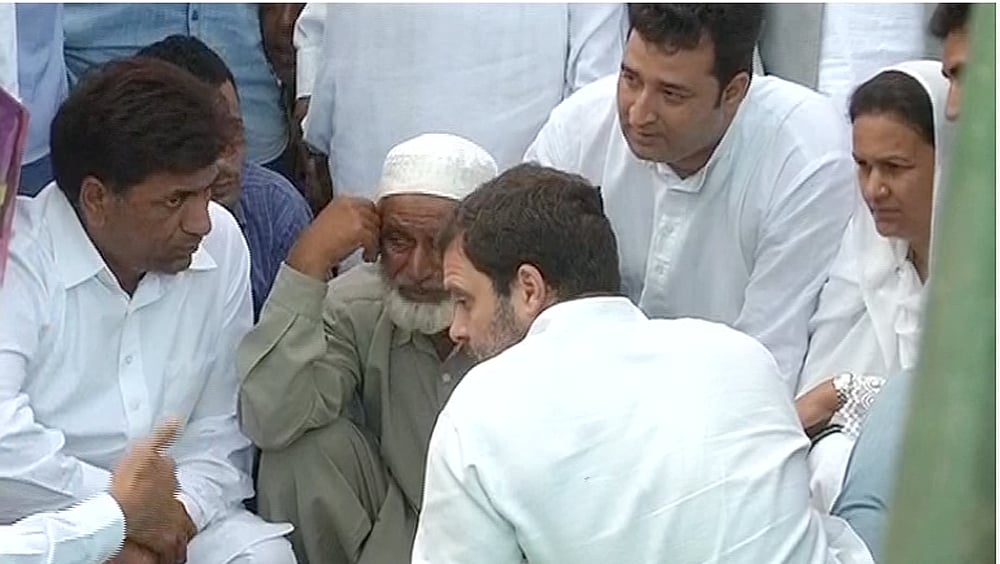 Rahul Gandhi in Balakot, J&K, meeting people affected by Pakistani shelling and firing, August 26, 2015. (Photo courtesy: ANI)