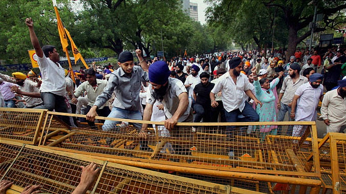 File photo of Sikh community members during a protest demanding justice for the victims of 1984 anti-Sikh riots at Jantar Mantar in New Delhi. 