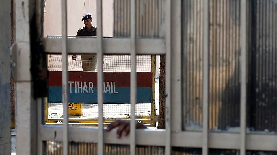 A policeman walks inside Tihar Jail in New Delhi. (Photo: Reuters) 
