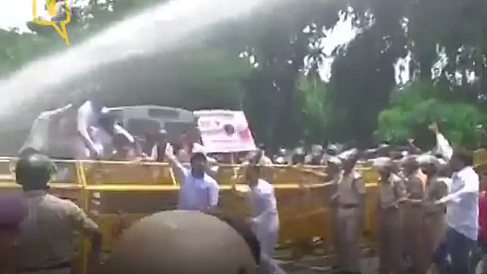 Police charge water cannons on protestors in Delhi. (Photo: ANI screengrab)
