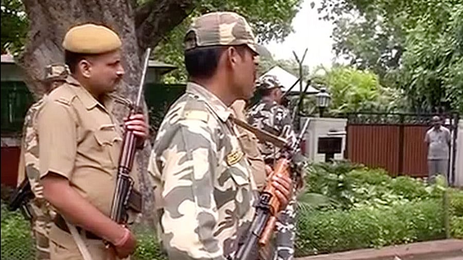 Police and army officials are seen outside Justice Misra’s residence. (Photo: ANI)