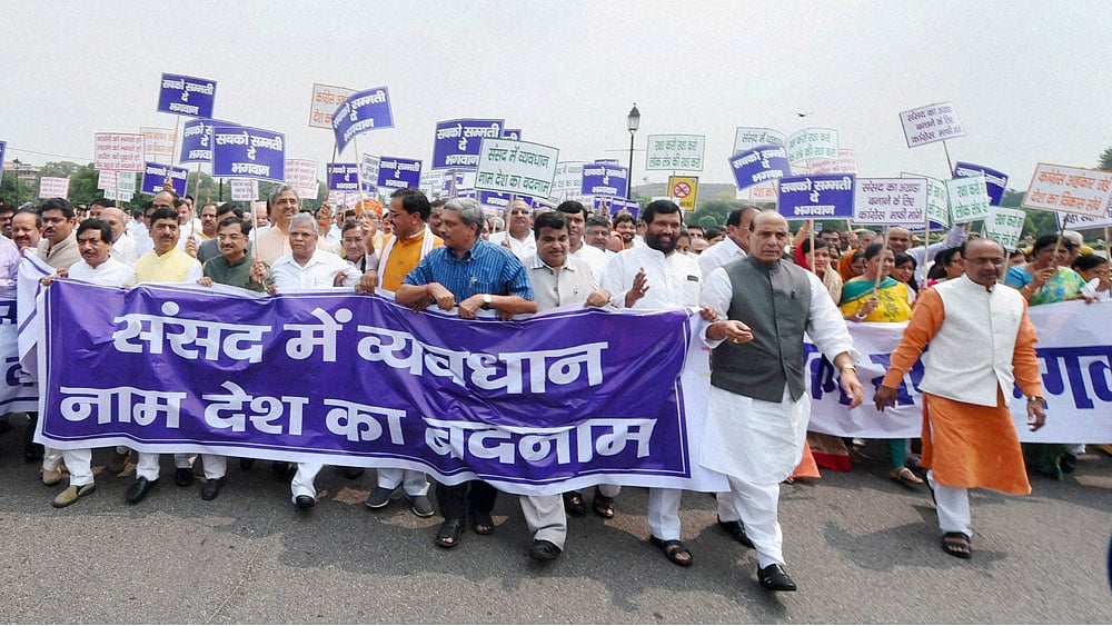 Senior BJP leaders and other NDA MPs participate in protest march from Vijay Chowk to Parliament House to Save Democracy in New Delhi, August 13, 2015. (Photo: PTI)