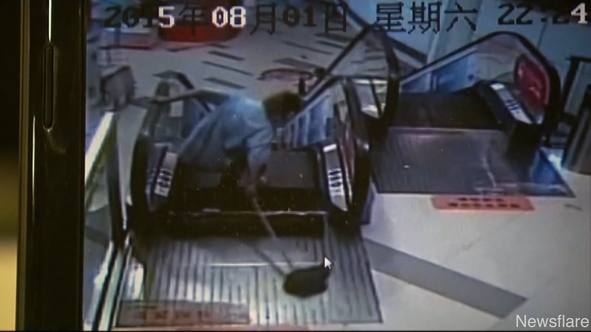 Zhang Shisheng, who got suck in an escalator in a mall in Shanghai, China. (Photo: AP Screengrab)