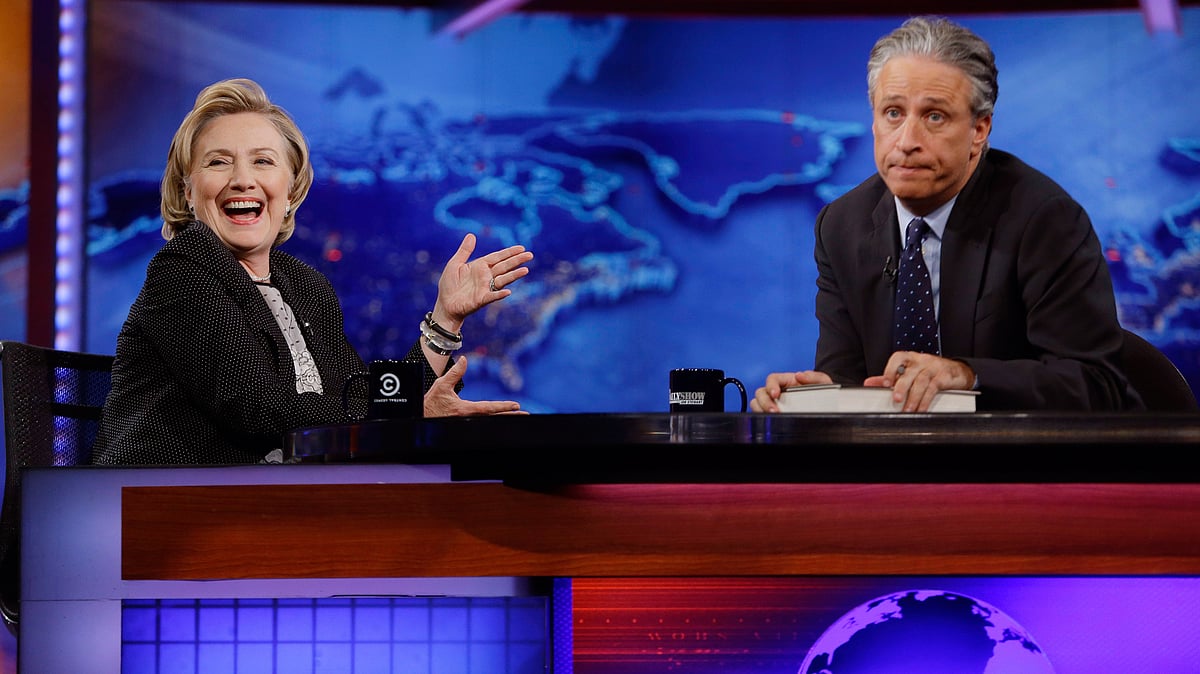 Former U.S. Secretary of State Hillary Clinton reacts to host Jon Stewart during a taping of “The Daily Show with Jon Stewart,” in New York. (Photo: AP)