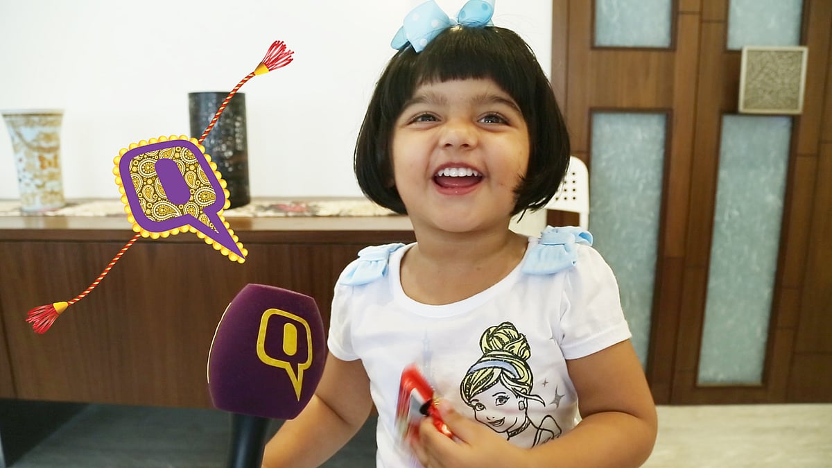 She wants a new dress, shoes, chocolates and many more things so that her brother deserves a rakhi this year. (Photo: <i>The Quint</i>)