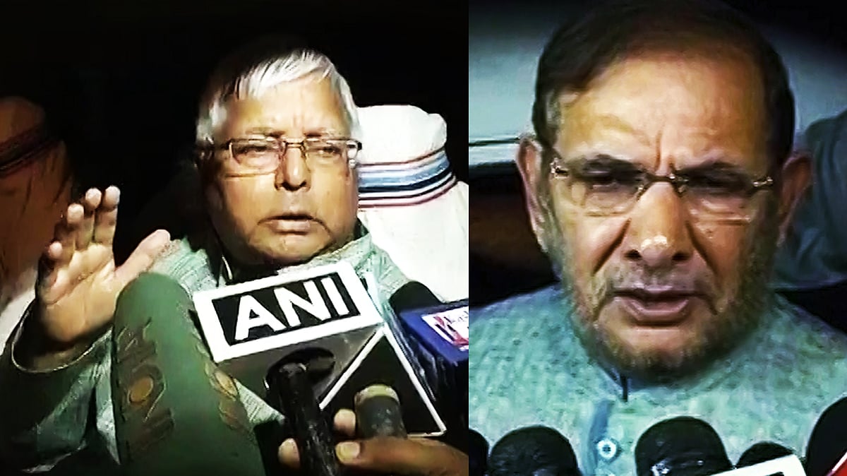 Lalu Prasad Yadav and Sharad Yadav. (Photo: ANI)
