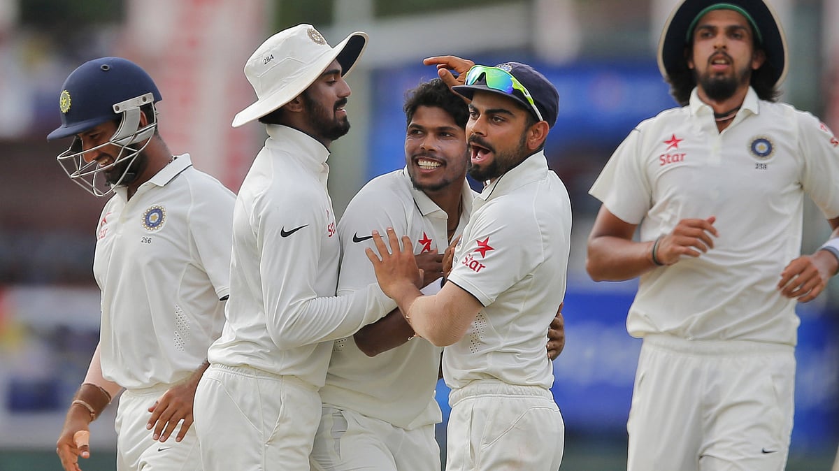 Umesh Yadav celebrated with his wicket with his teammates. (Photo: AP)