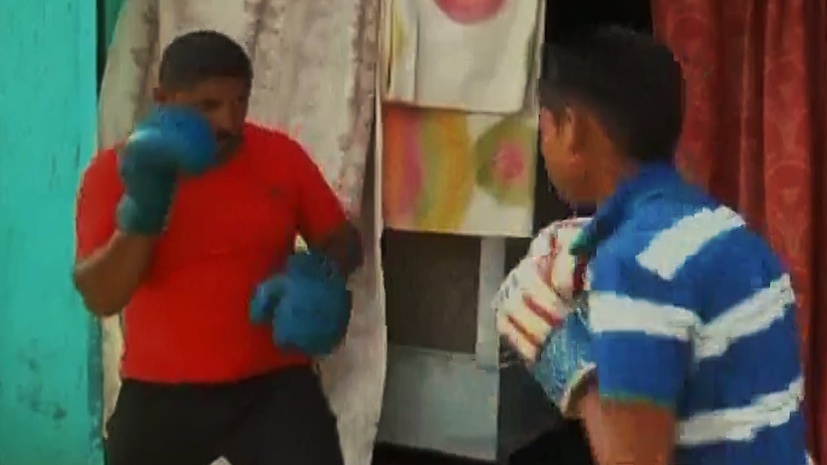 Kamal Kumar training with his son. (Photo: ANI screengrab)
