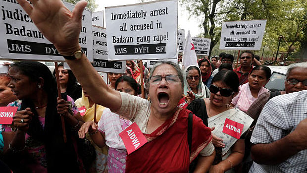 Demonstrators from All India Democratic Women’s Association (AIDWA) hold placards and shout slogans during a protest against the killings of two teenage girls, in New Delhi May 31, 2014. (Photo: Reuters)