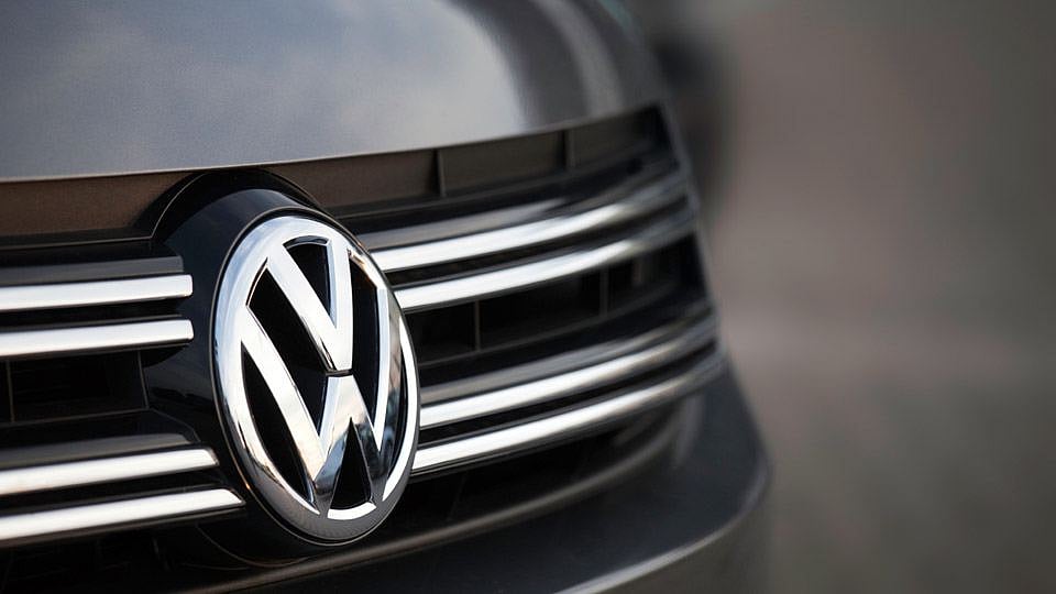 VW Motor Company Badge on a new car outside a dealership. (Photo: iStock)