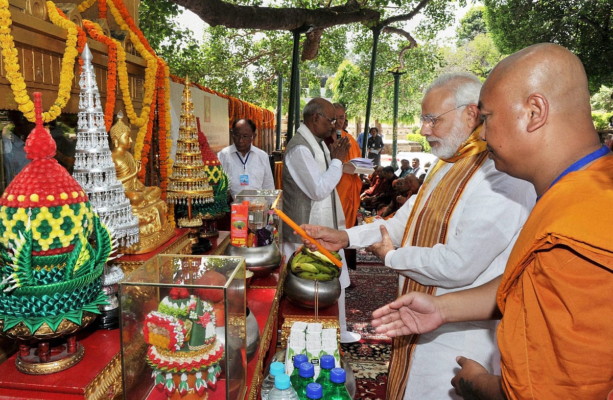 Prime Minister Narendra Modi offering prayers at the Mahabodhi Temple in Bodh Gaya on Saturday. (Photo: PTI)