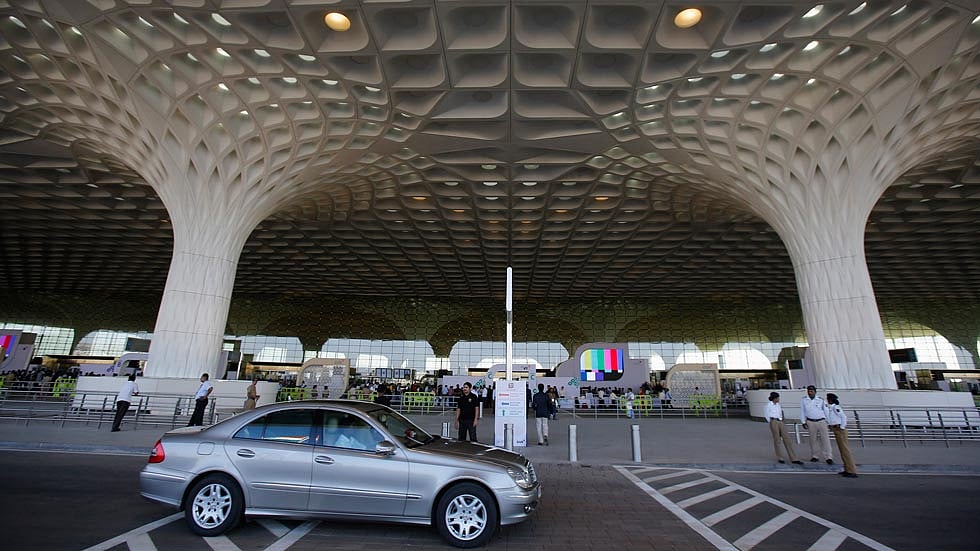 Security personnel stand outside Terminal 2 at Chhatrapati Shivaji International Airport in Mumbai.&nbsp;
