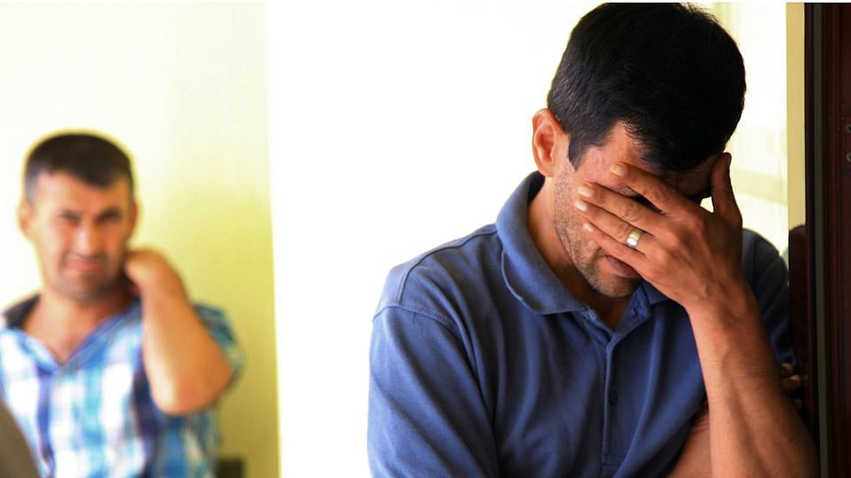 Abdullah Kurdi, 40, father of Syrian boys Aylan, 3, and Galip, 5, who were washed ashore on a beach near Turkish town of Bodrum on Wednesday, cries as he waits for the delivery of their bodies outside a morgue in Mugla, Turkey. (Photo: AP)