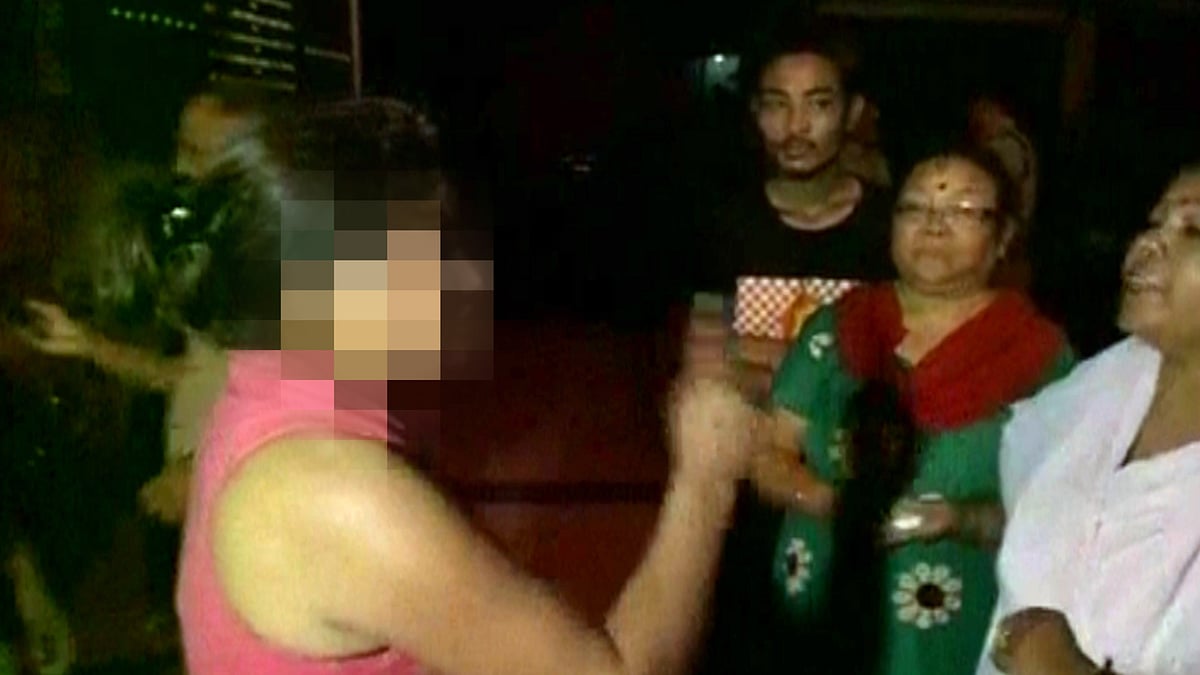 The drunk woman created ruckus outside a police station in Dehradun. (Photo: ANI screengrab)