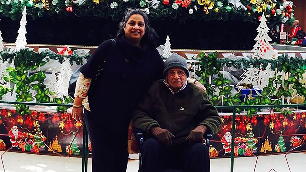 Sangeeta Murthi Sahgal at a city mall with her father who was diagnosed with Parkinson’s Disease in 2008. (Photo Courtesy: Sangeeta Murthi Sahgal).