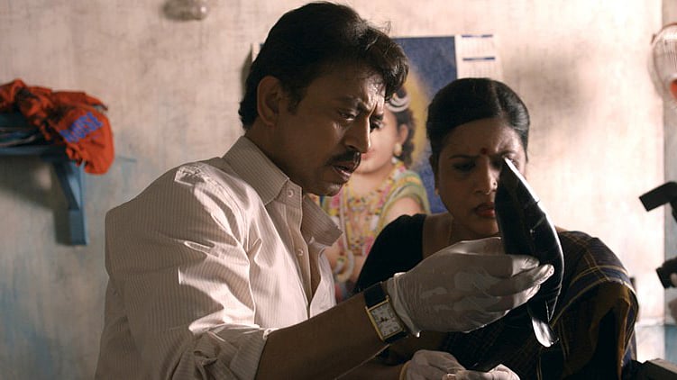 Irrfan Khan and a co-actor in a scene from <i>Talvar</i>
